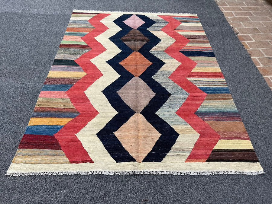 Explore the artisanal allure of Ayaz Handwoven Antique Kilim Rug, a timeless piece for your decor.