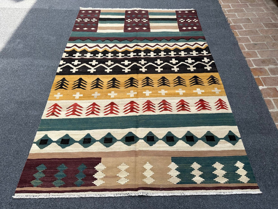 Experience the cultural richness of Willow Handwoven Antique Kilim Rug, a statement piece for your decor.