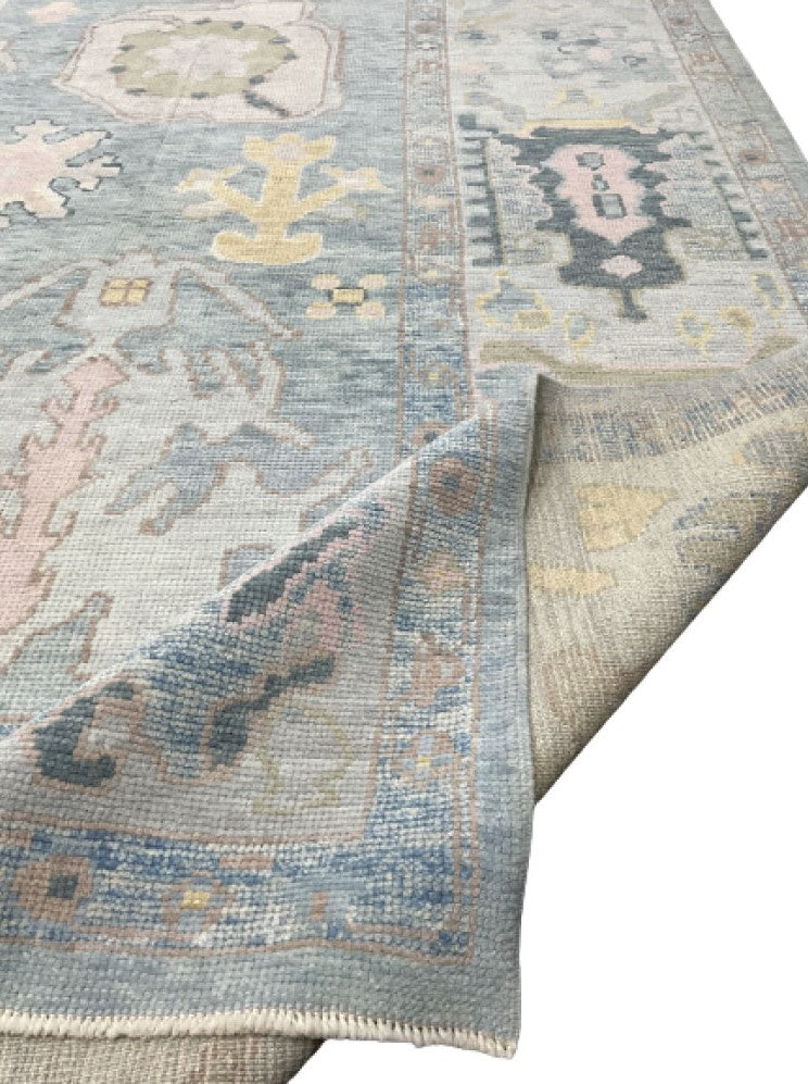 Discover the modern sophistication of LA Modern Hand-Knotted Oushak Rug, an elegant statement for your decor.