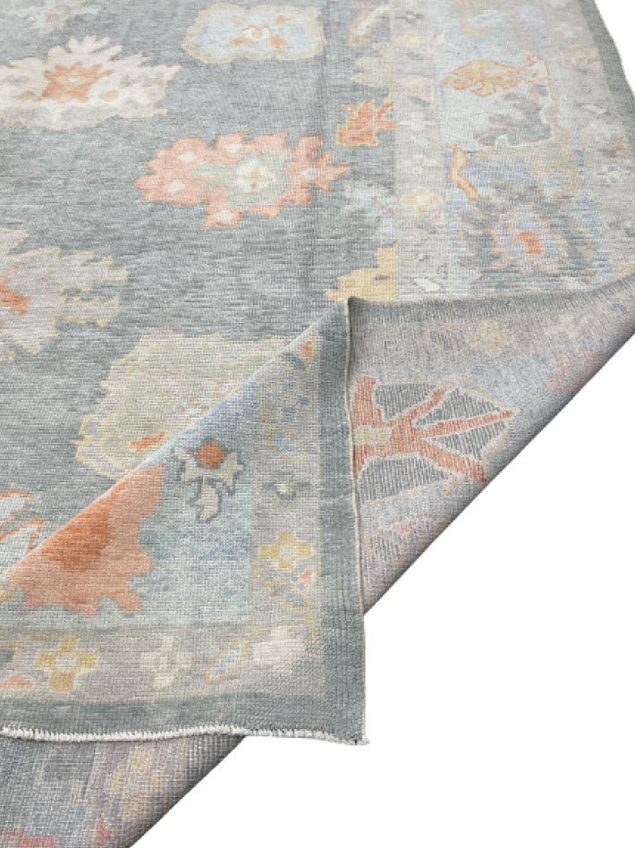 Discover the refined allure of March Modern Hand-Knotted Oushak Rug, an elegant statement for your decor.