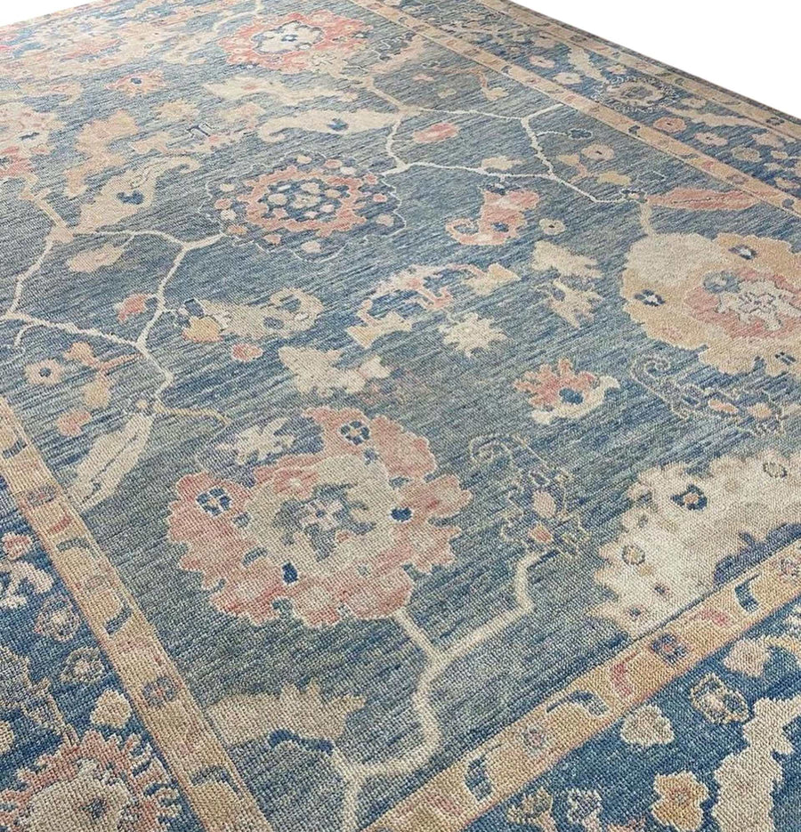 Unveil the timeless elegance of Sarosh Vintage Hand-Knotted Turkish Oushak Rug, a refined addition to your interior.