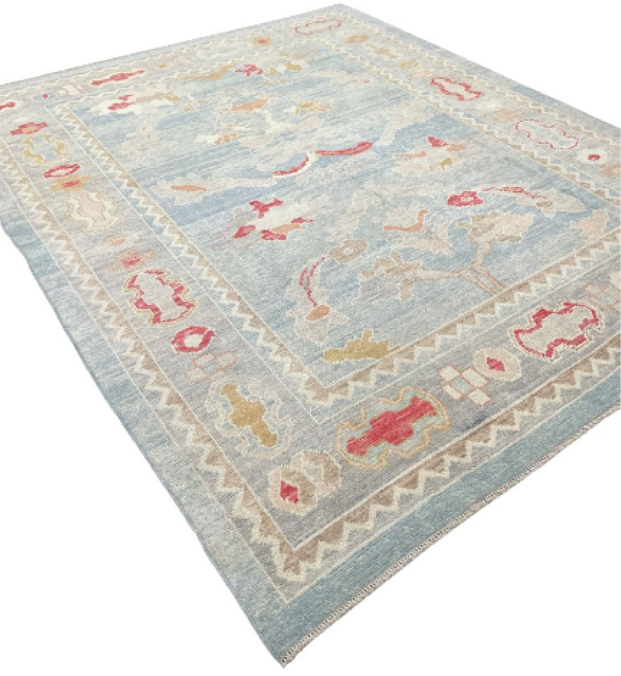 Unveil the timeless beauty of Sea Breeze Vintage Hand-Knotted Oushak Rug, a refined addition to your interior.