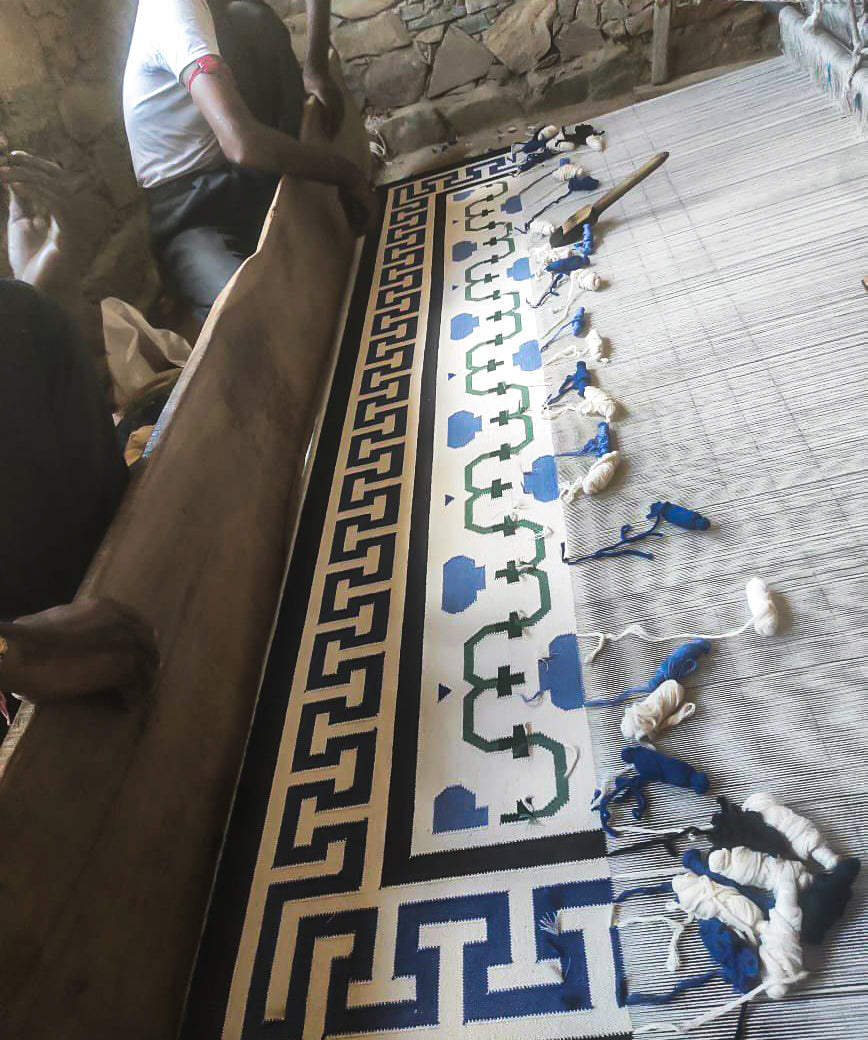 Hand Weaving process of the Shahjehan Flatweave Dhurrie Rug