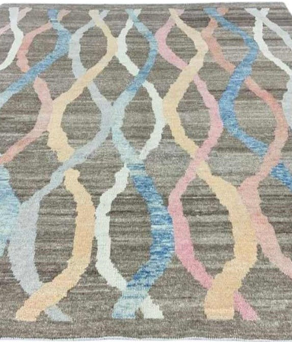Unveil the modern sophistication of Tangier Modern Neutral Hand-Knotted Oushak Rug, an elegant accent for your interior.