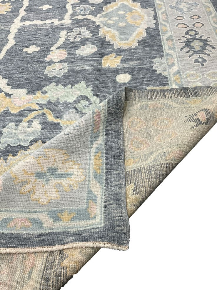 Explore the timeless elegance of Tokyo Vintage Hand-Knotted Turkish Oushak Rug, a graceful addition to your decor.