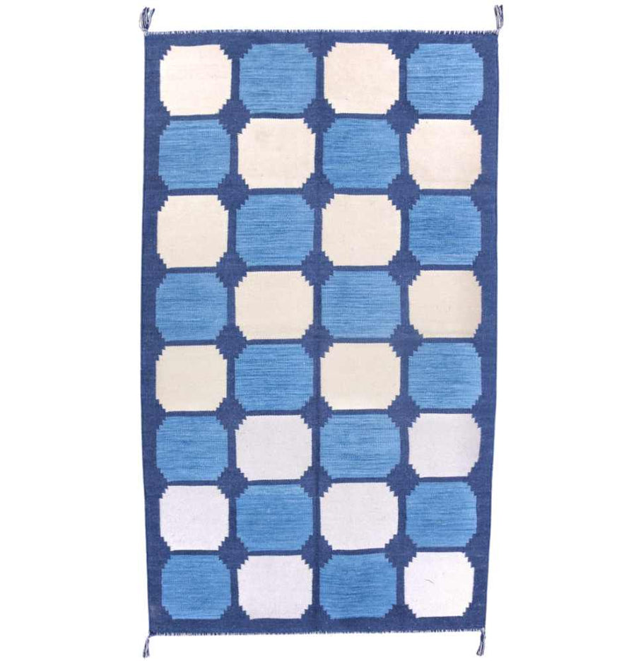 Blue Tile Dhurrie Rug - a harmonious blend of intricate design and serene blue hues.