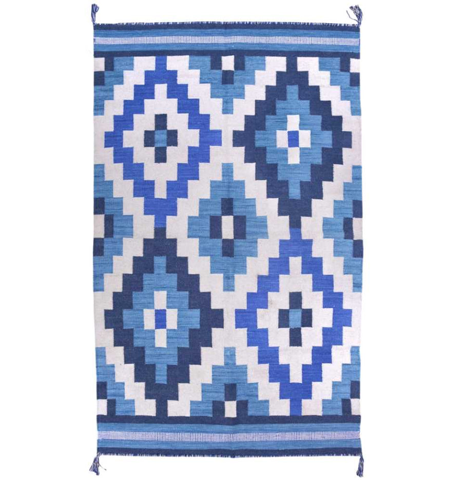 Blue Jaal Dhurrie Rug - a symphony of intricate design and soothing blue tones.