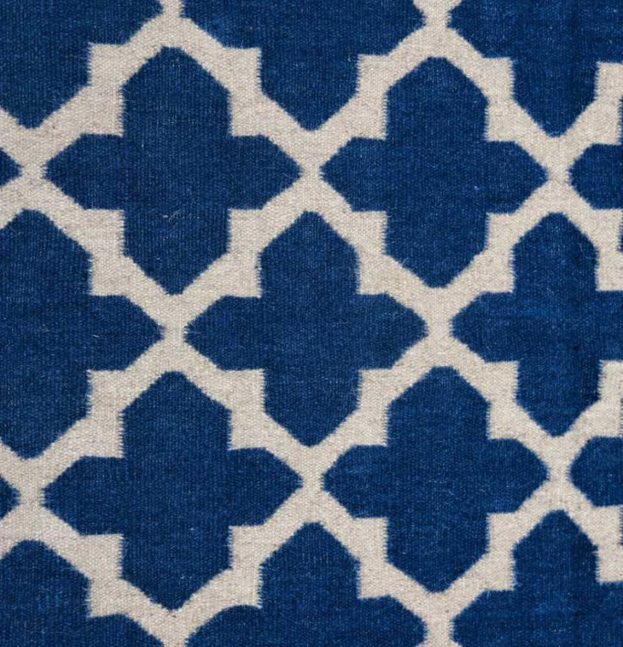 Discover the artistry behind the weaving process of Casablanca Trellis Flatweave Dhurrie Rug, a timeless addition to your space.