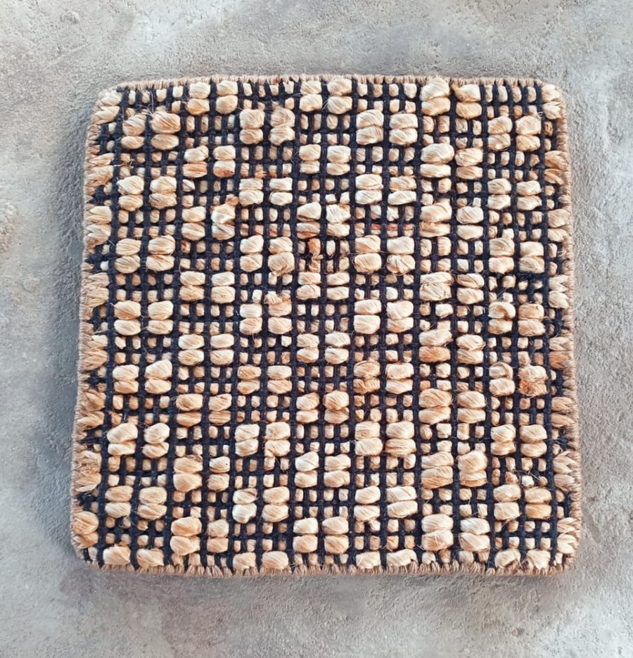 Discover the natural charm of Liverpool Handwoven Jute Rug, a sustainable statement for your decor.