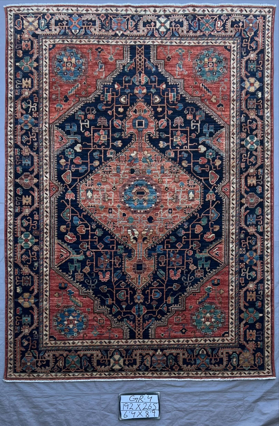 Antique Hand-Knotted Heriz Serapi Rug - Elif, a reflection of timeless grace.